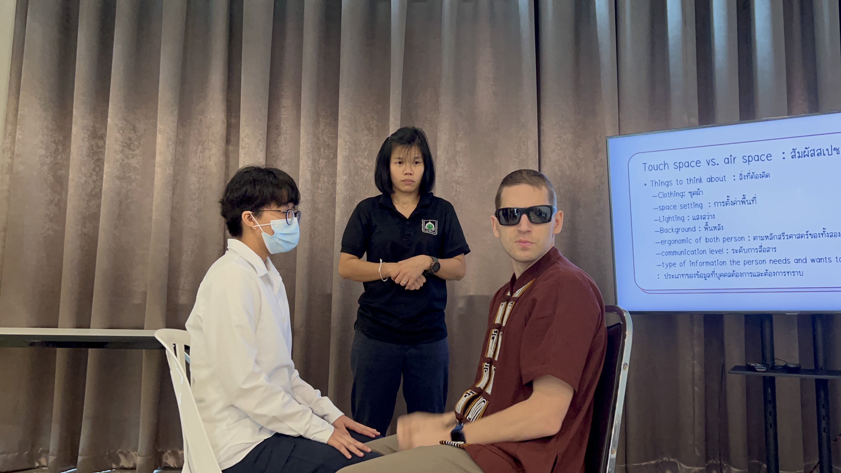 Participants engaged in hands-on communication training during an accessibility and inclusion workshop.
